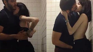 Marina Fraga's boyfriend joins her for a public restroom romp