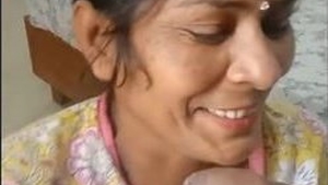A mature Indian wife performs oral sex on her husband
