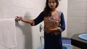 Alice, the charming Desi girl, showcases her beauty in an elegant dress in this paid video