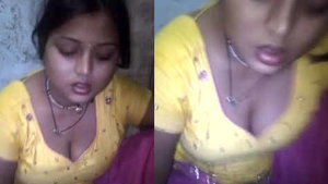 A lovely girl displays her creamy bosom while dining