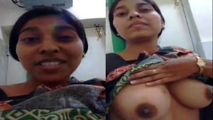 Young girl flaunts her large breasts and fleshy nipples in a nude video