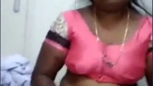 Enjoy a Tamil aunty's boob press in this hot video