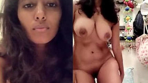 Busty Indian woman displays her assets