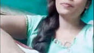 Watch a stunning Indian girl with big boobs and a sweet pussy in action