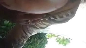 Outdoor sex tape of a passionate and aroused rural woman being penetrated