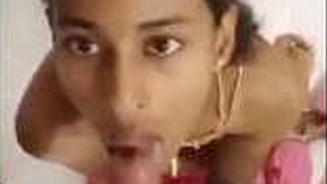 Indian petite woman engages in oral sex