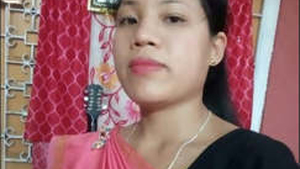 A Guwahati girl proudly displays her ample bosom