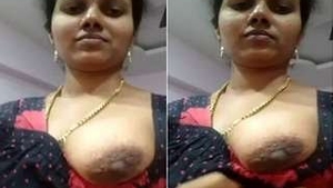 Desi wife flaunts her big tits in front of camera