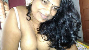 Hot Tamil auntie gives a blowjob