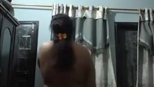 A curvy mom from India flaunts her ample backside