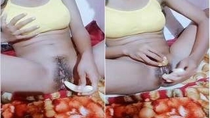 Indian girl gets naughty with a banana in this steamy video