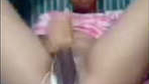 Watch a beautiful Desi girl pleasure herself in this solo video