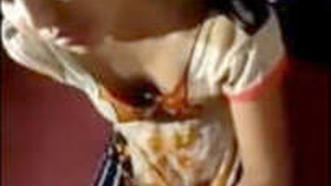 Desi's lover strips down to show off her hot big ass in a steamy video