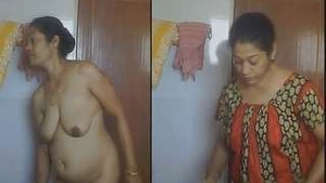 Watch a beautiful Desi wife undress and prepare for a relaxing bath