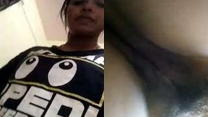 Tamil babe flaunts her big boobs and pussy