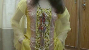 Young woman's sensual striptease for her lover