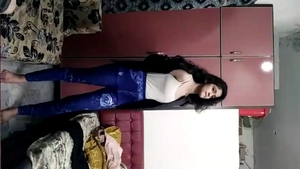 A stunning Indian beauty undresses to showcase her flawless physique