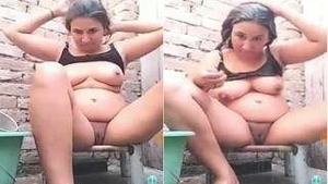 Pakistani auntie takes a bath in public
