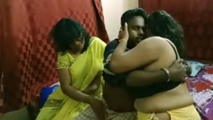 A guy and a girl play chess while showing off their big boobs