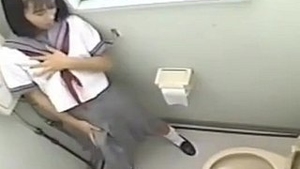 Adorable Japanese woman with a cock