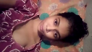 A tantalizing video featuring an attractive Indian woman showcasing her ample bosom