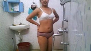 Indian college student Nikita takes a bath in the nude