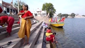 Tamil mature aunts bathe and show off their big boobs
