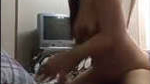 Aroused South Asian wife simulates sex with a pillow