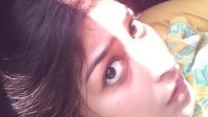 A charming young Indian woman performs oral sex