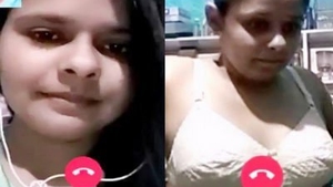 A South Asian woman with large breasts from her office engages in inappropriate behavior