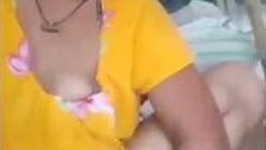 Hot Indian wife pleasures herself with her fingers