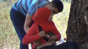 Arab couple kisses and fondles each other's breasts in the great outdoors