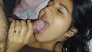 Indian wife sucking cock and swallowing cum in bedroom