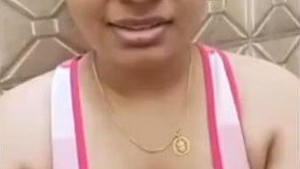 Indian aunty displays her breasts
