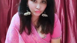 Indian wife with huge boobs gets naughty on camera