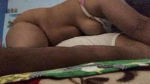 Indian spouse vigorously riding and sexually pleasuring in a cowgirl position