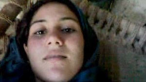 Nepali woman pleasures herself with a condom on