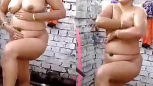 Indian Bhabhi Bathing captured by Hubby