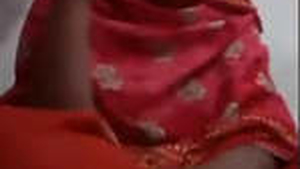 A girl from Bangladesh performs on a video chat