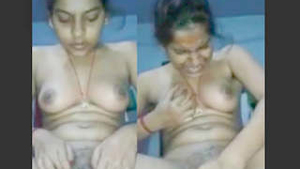 Indian girl reveals her boobs and masturbates on camera