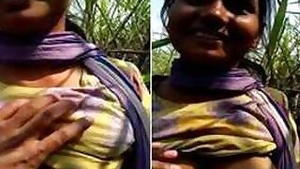 Enticing Indian chick allows boy to touch her XXX breasts outdoors