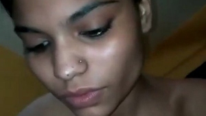 Indian housewife moans while riding in sensual video