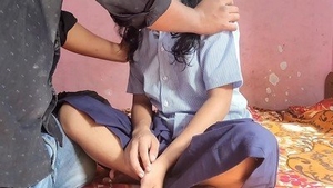 A South Asian girl returns from school and engages in sexual activity with her male companion