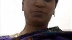 Indian matron displays her breasts during a video chat