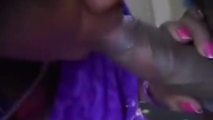 Mature Tamil woman gives her son a blowjob