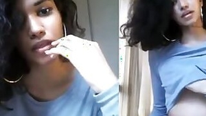 Skinny Desi webcam model wears blue T shirt and never takes it off