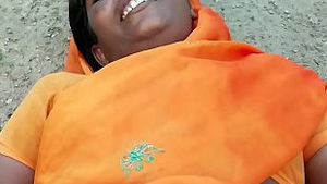 A Telugu woman indulges in a pleasurable self-pleasure session using her hands and sex toys