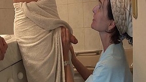 A French mother entices a young man despite her large pubic hair and gets examined