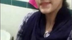 Young Indian woman captures intimate selfie footage