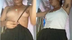 Beautiful girl shows off her breasts in a steamy video